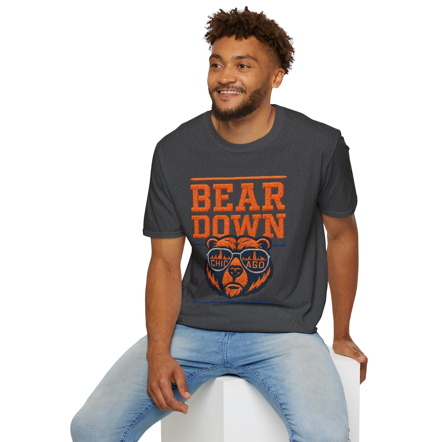 Man wearing a dark gray t-shirt with 'Bear Down' graphic design on a white background